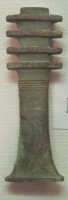 Figure 14. Amulets such as this Djed (“stability”) pillar, a symbol of Osiris, were placed in the mummy wrappings to ward off evil.