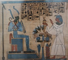 The god Osiris receiving offerings from Padiamenet